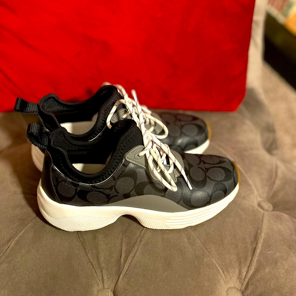 Gently used Coach sneakers.
